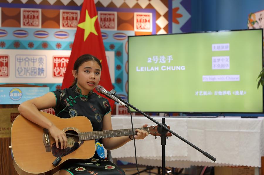 Student performing in China
